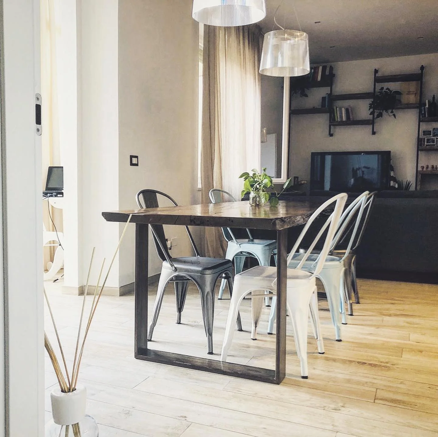 Mix Industrial Chairs with a Rustic Wood Table