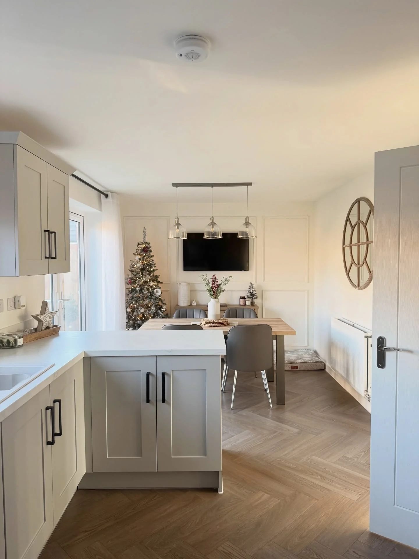 Herringbone Wood-Look Flooring Adds Natural Warmth