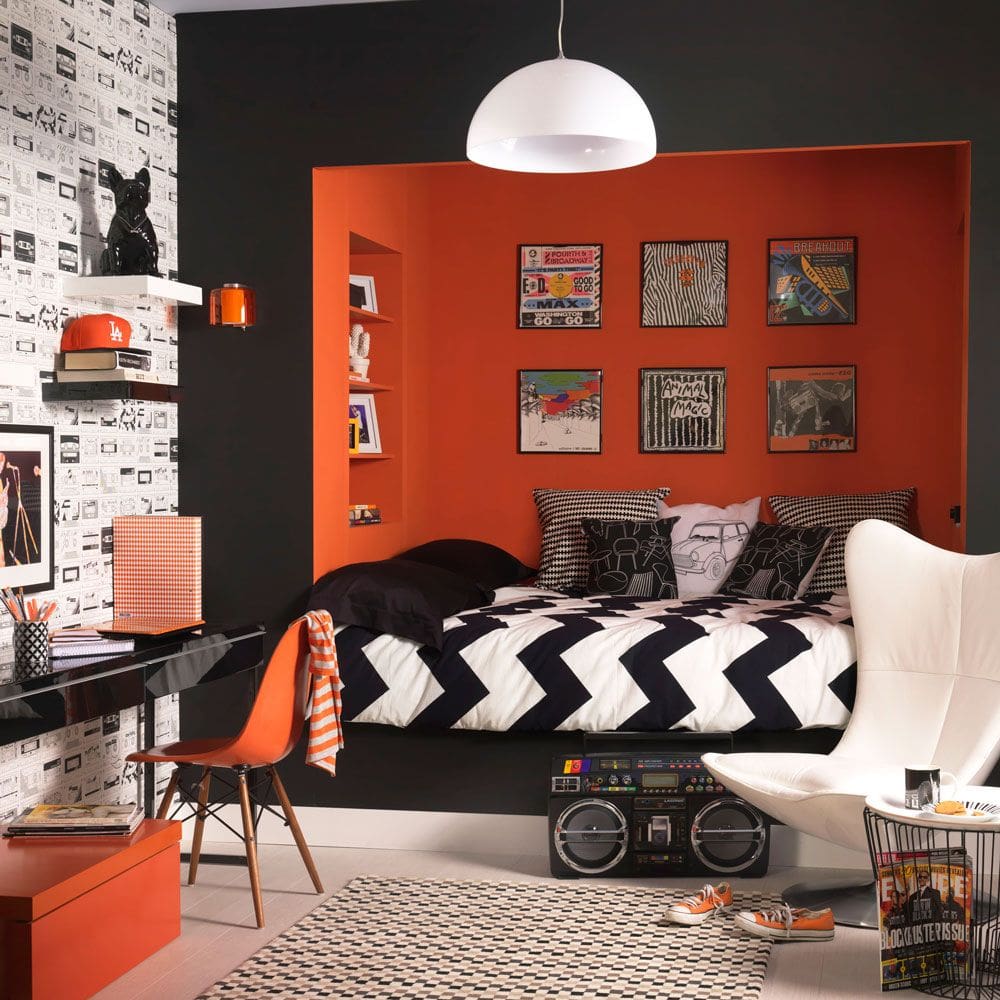 Orange Recessed Niche Frames Artwork Above Bed