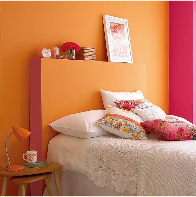 Orange and Magenta Walls Create a Striking Two-Tone Bedroom