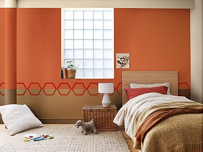 Orange and Tan Walls With a Repeating Hexagon Border