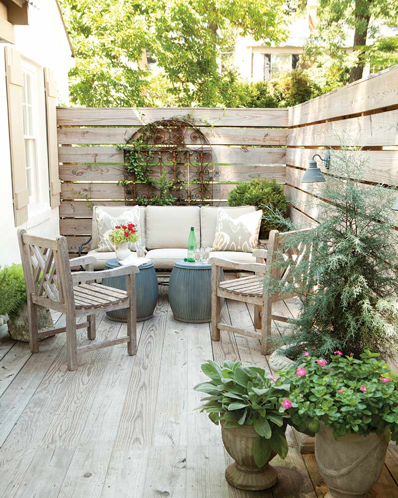 Rustic Wood Chairs Frame a Cozy Outdoor Seating Area