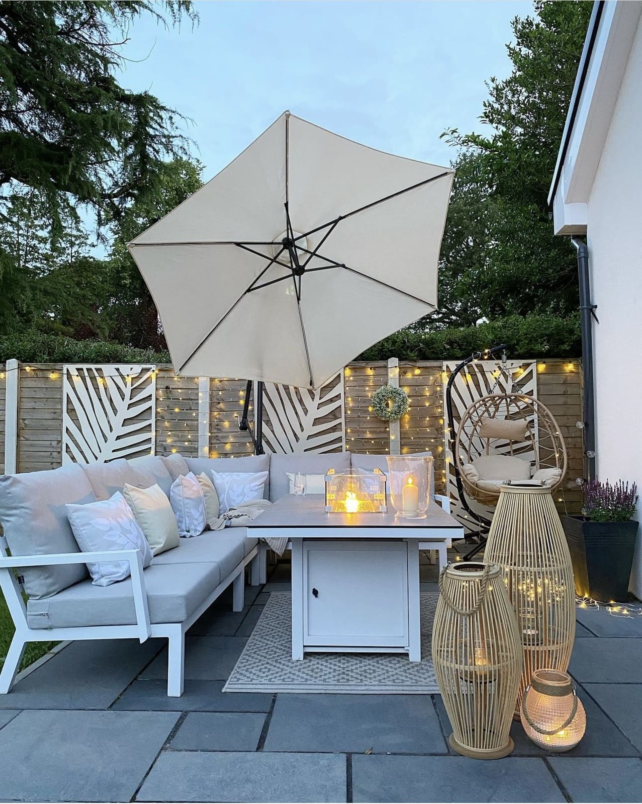 Tall Bamboo Lanterns Add Cozy Ambiance to Paved Patios