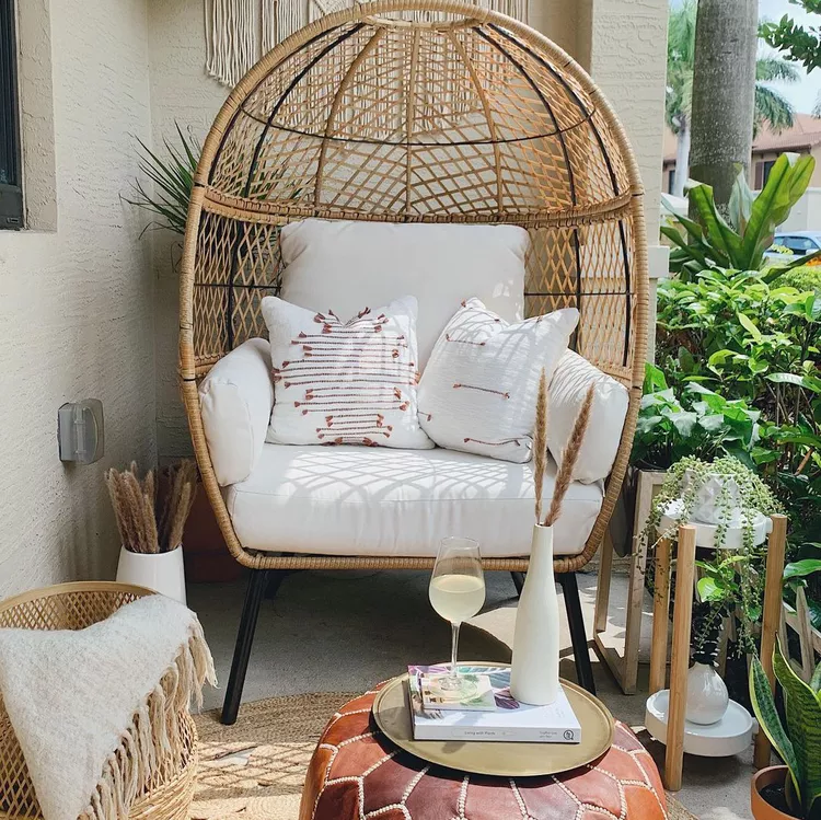 Egg Chair with Boho Pillows Creates a Cozy Nook