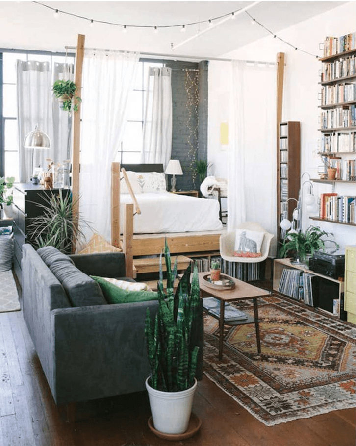 Wooden Bed Frame Acts as a Room Divider