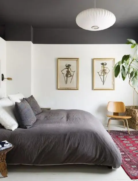 Dark Ceiling Creates a Dramatic Two-Tone Effect Above White Walls