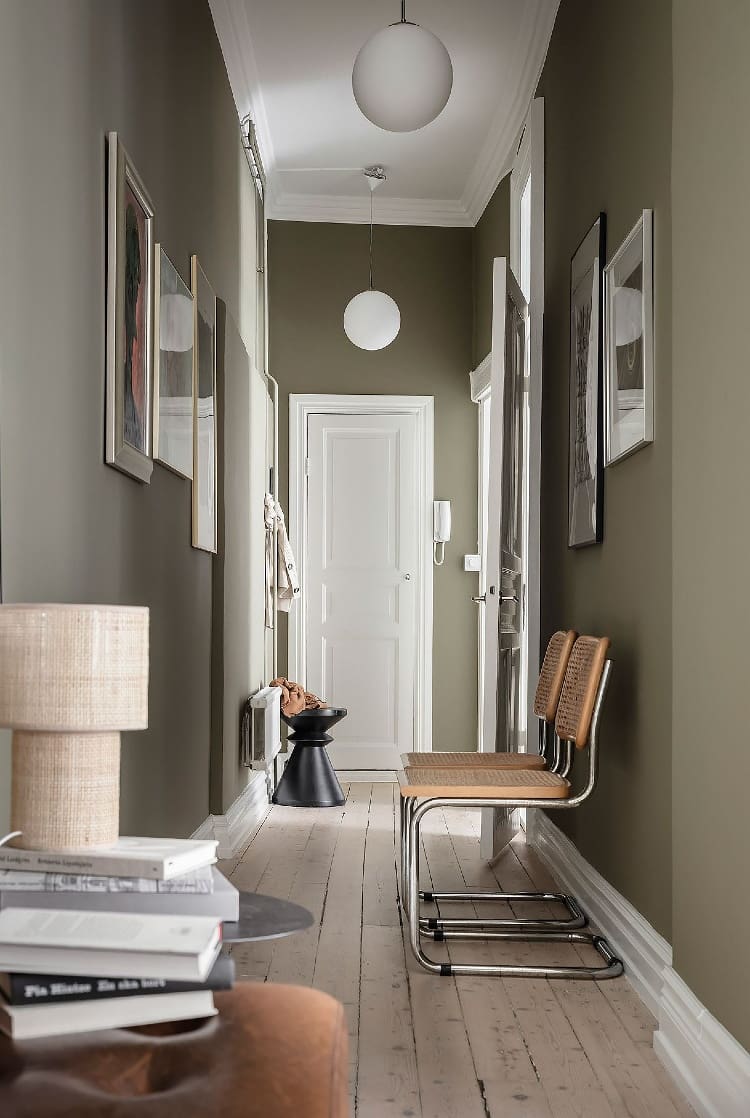 Complement Art with Muted Olive Green Walls