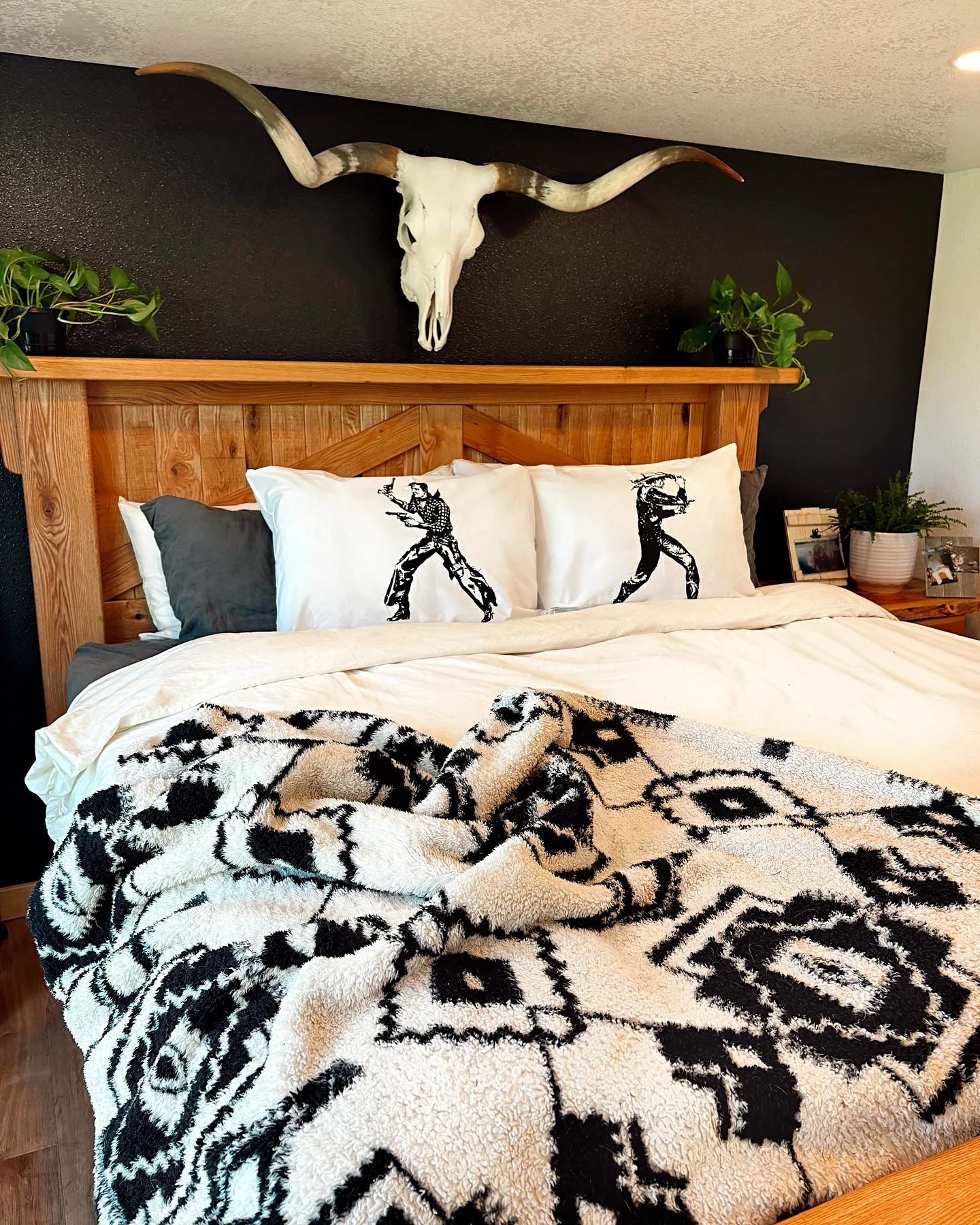Frame Your Headboard with a Longhorn Skull and Greenery