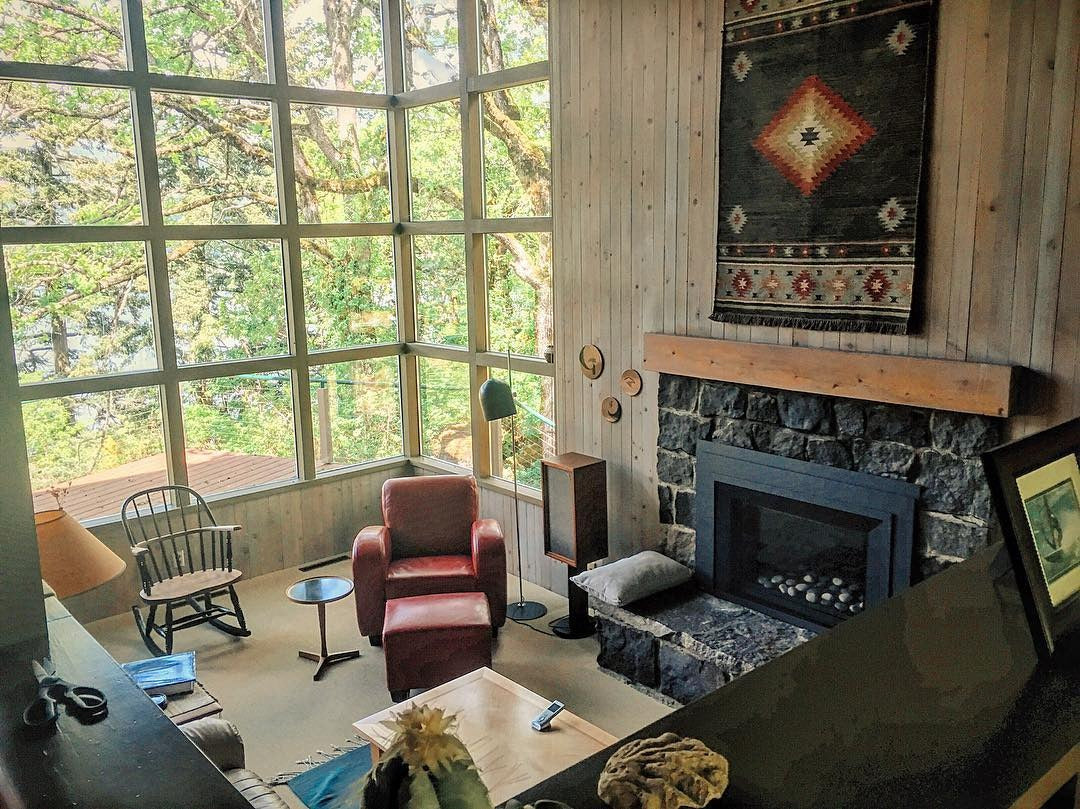 Woven Southwestern Rug Adds Geometric Pattern Above Fireplace