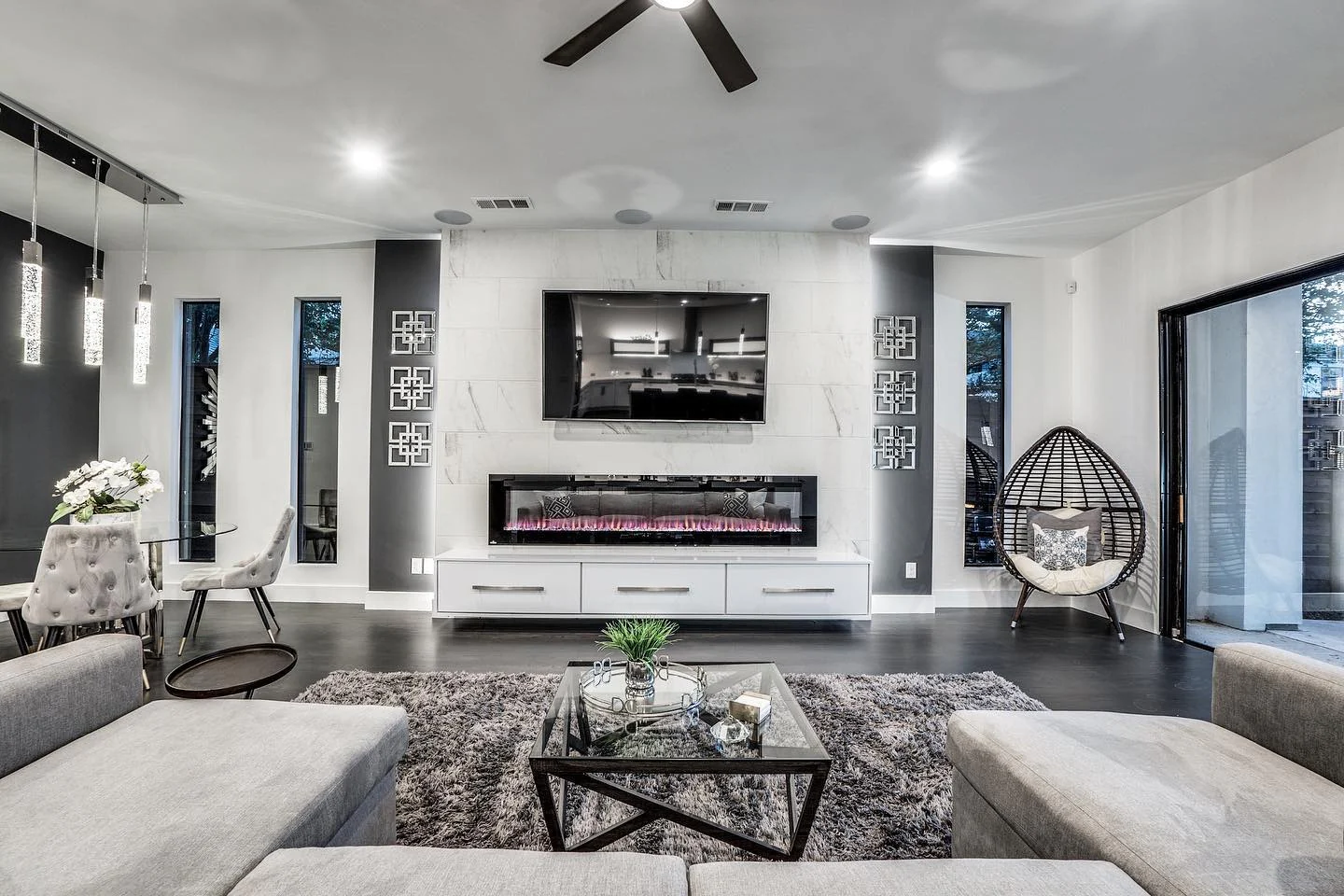 Geometric Metal Panels Add Rugged Texture Beside the Fireplace