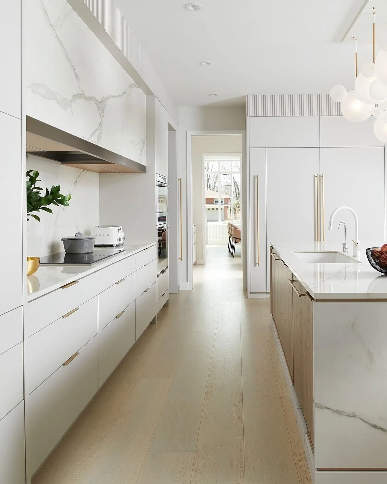 Thin Linear Drawer Pulls Complement White Cabinetry