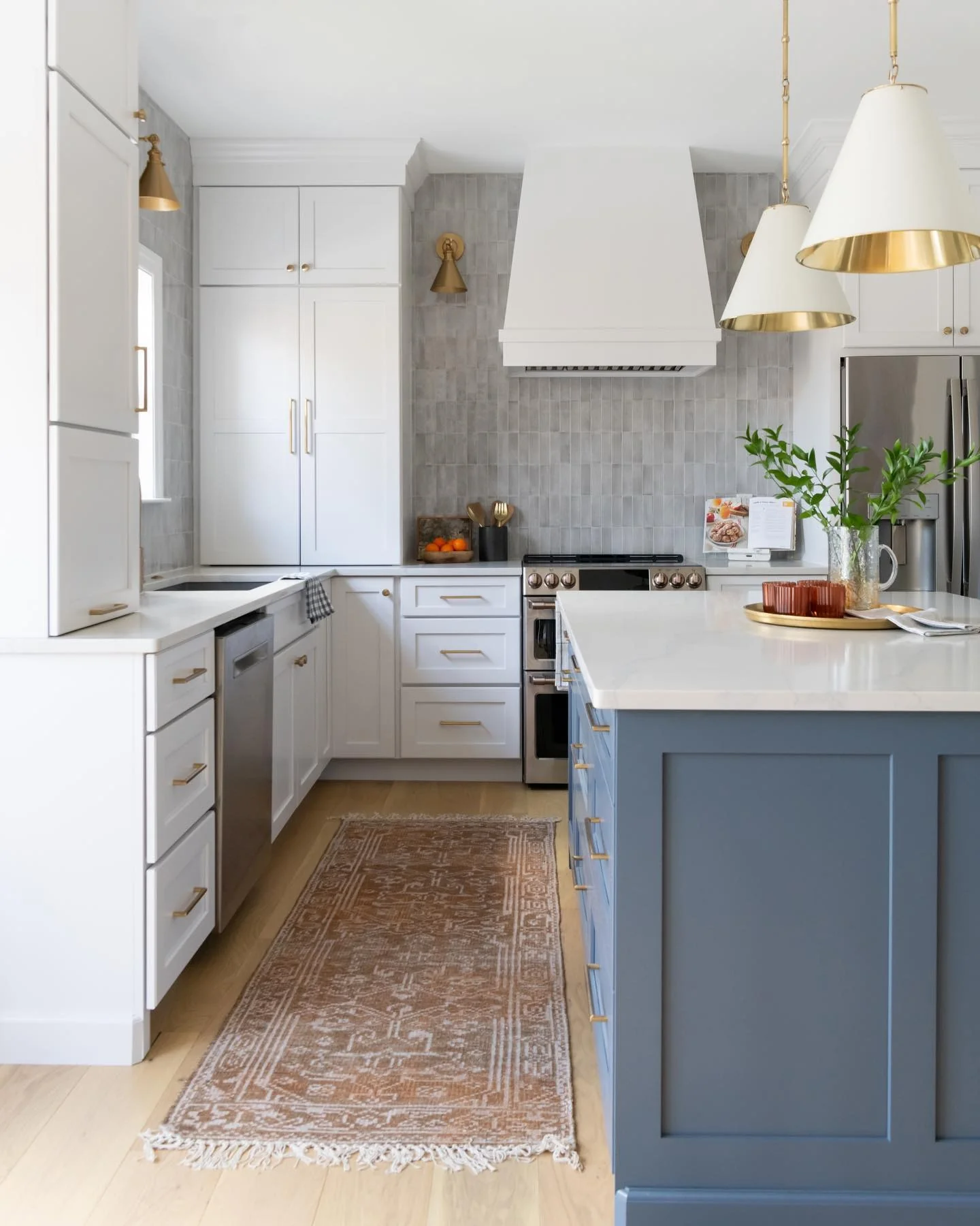 Patterned Runner Adds Warmth to White Kitchen Floors