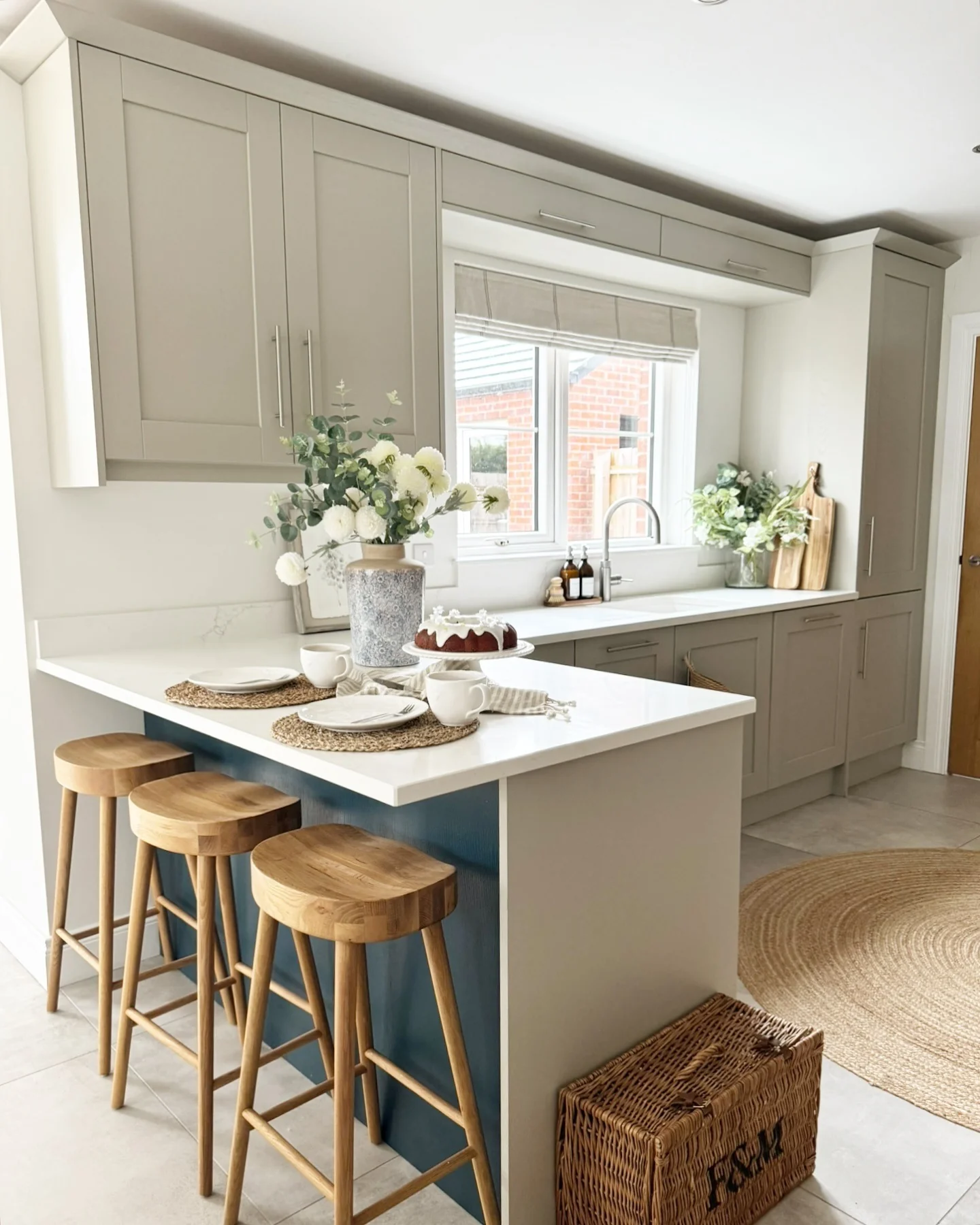 Two-Tone Island: Blue Base Meets White Countertop