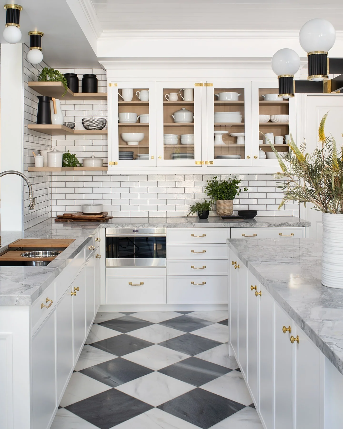 Marble Countertops Shine with Classic Brass Hardware