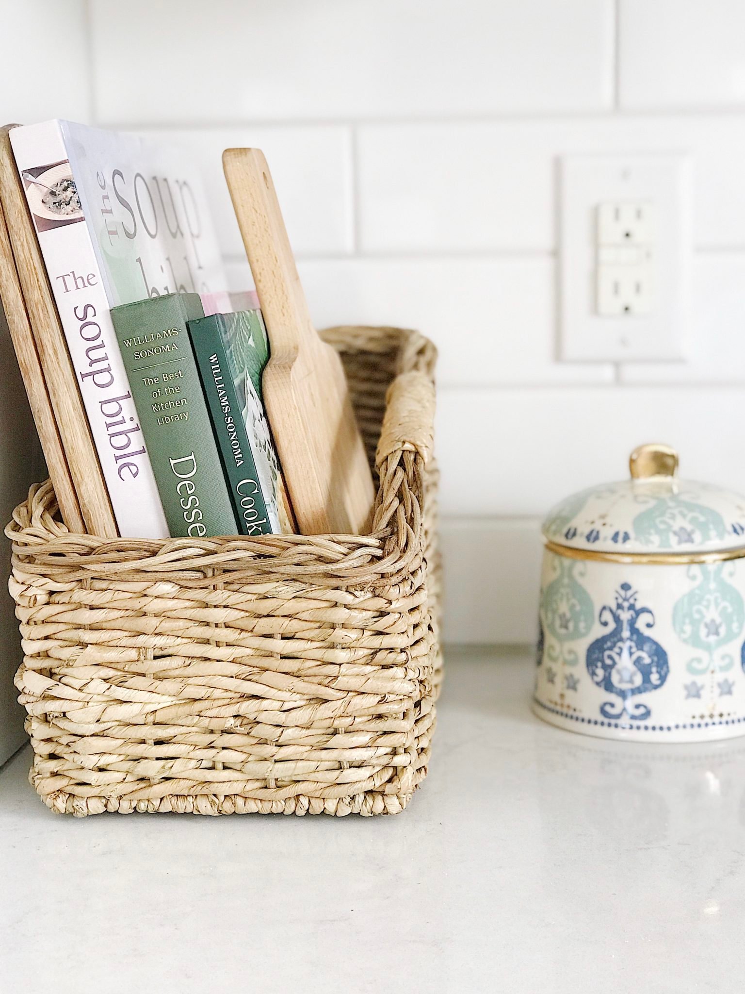 Contain Cookbooks and Cutting Boards in a Woven Basket