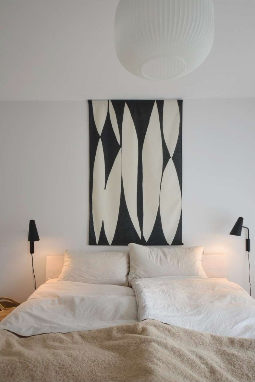 Anchor Your Bed with Oversized Graphic Art