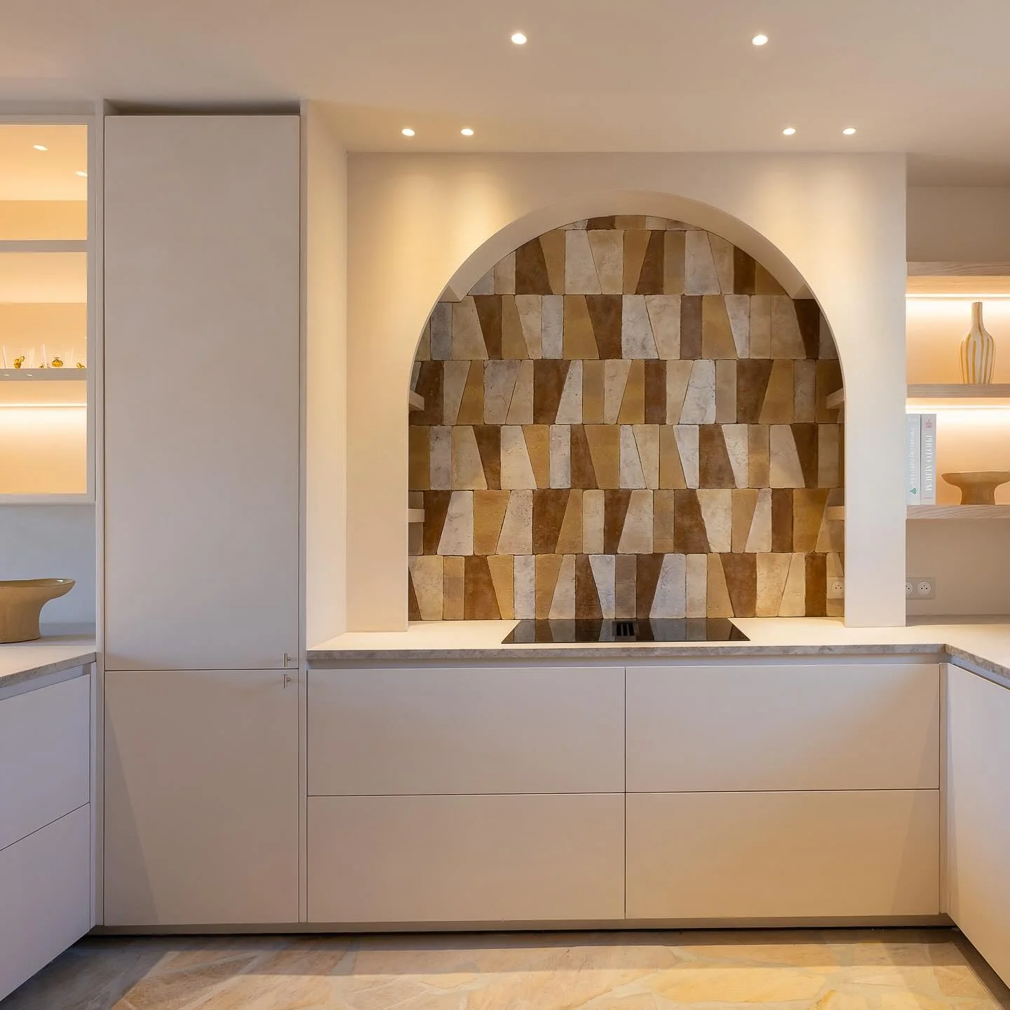 Arched Niche with Geometric Tile Creates a Warm Focal Point
