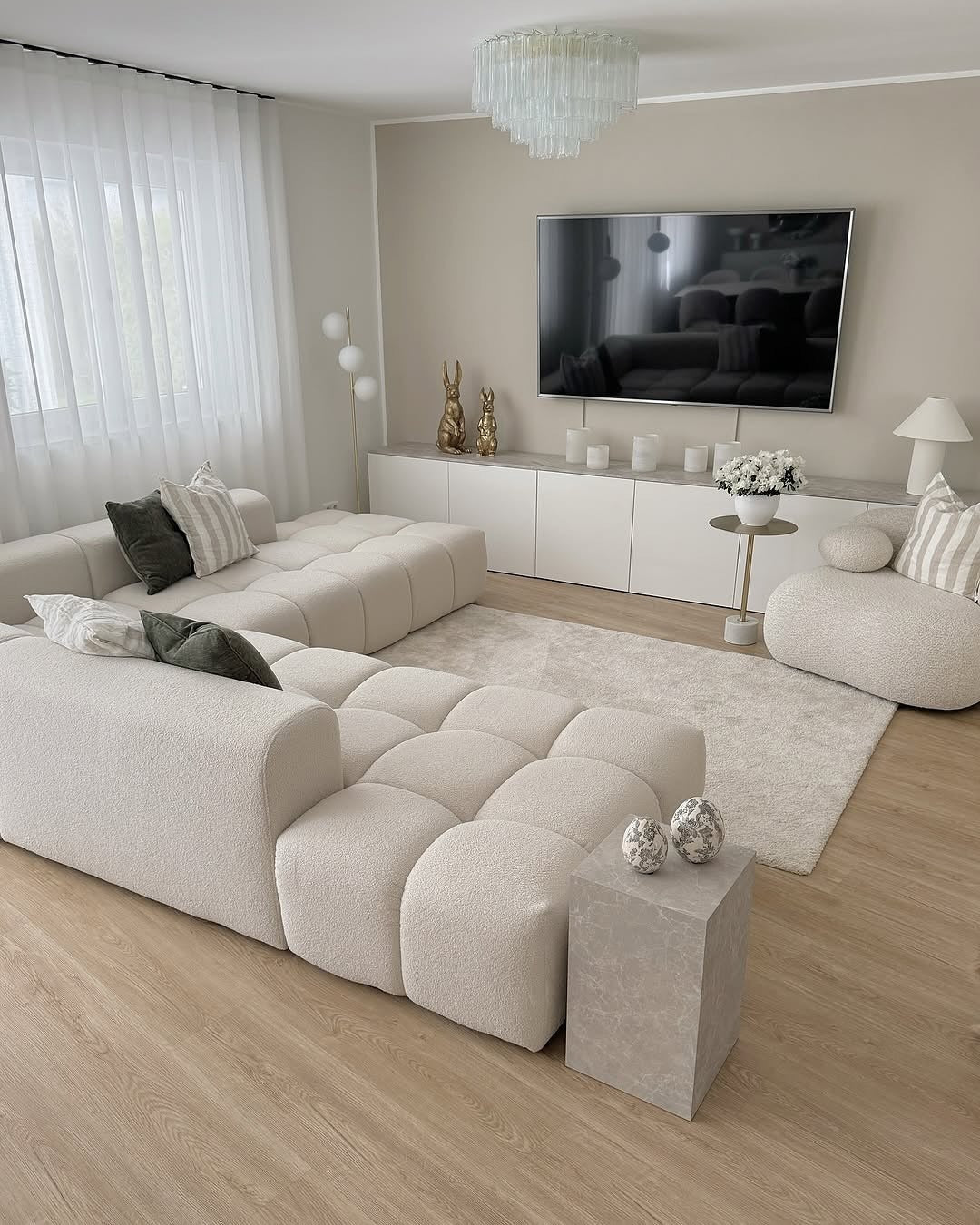 Textured Bouclรฉ Sofa Creates a Cozy, Modular Seating Area