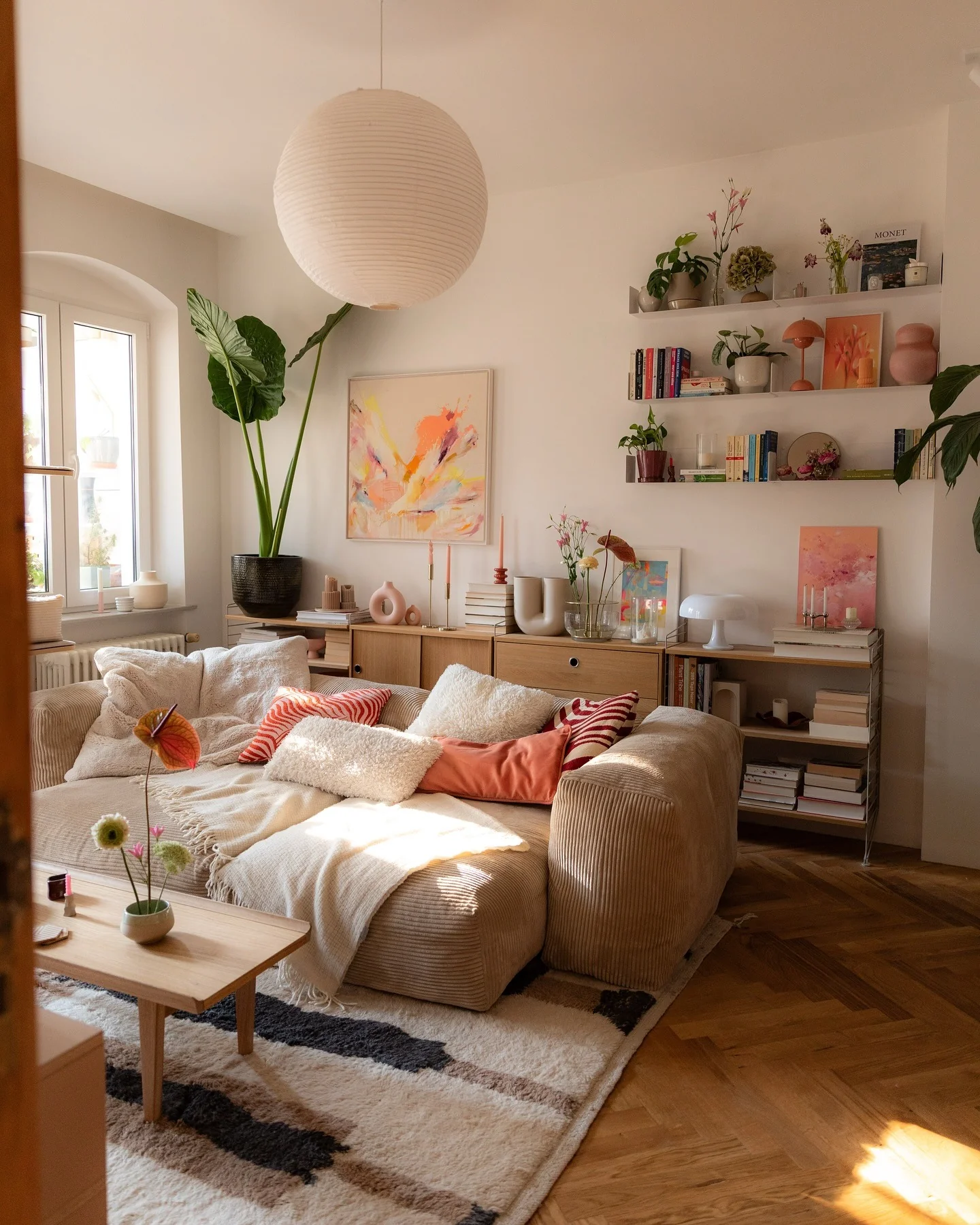 Clear Shelving Displays Artful Objects and Books