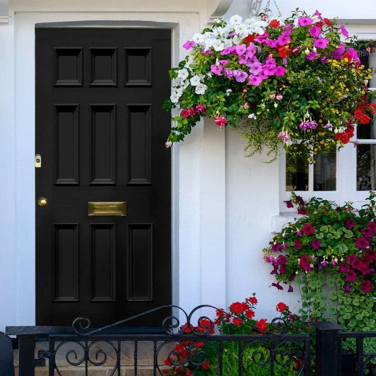 Hanging Flower Baskets Add Color Next to Your Black Door