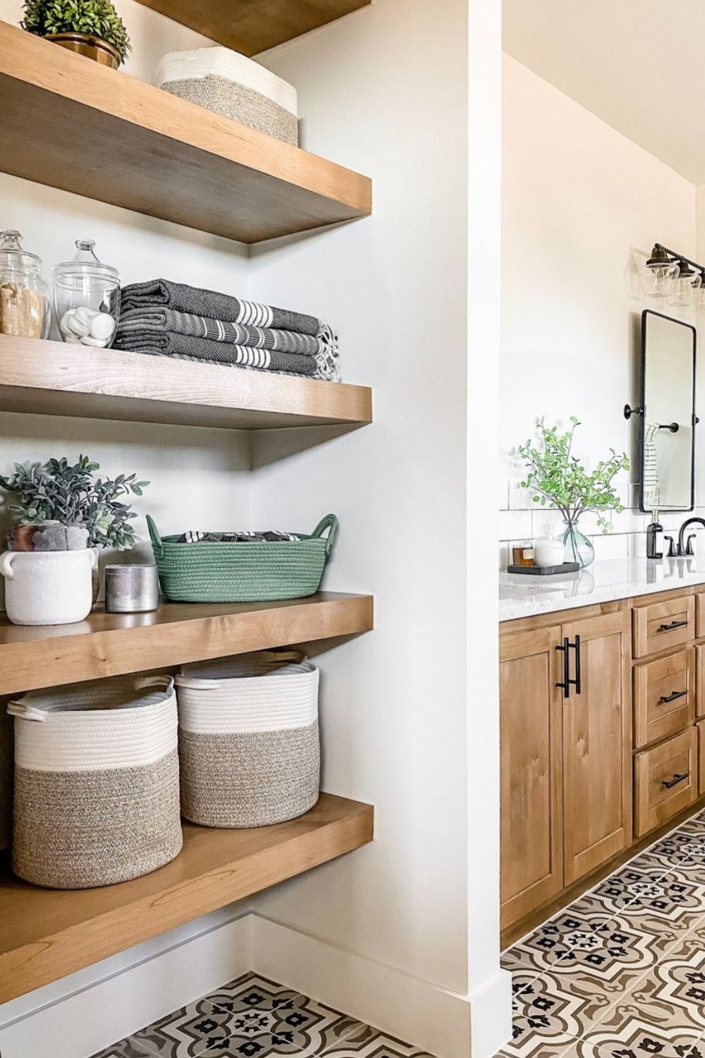 Combine wooden shelving with two-tone rope baskets for soft storage