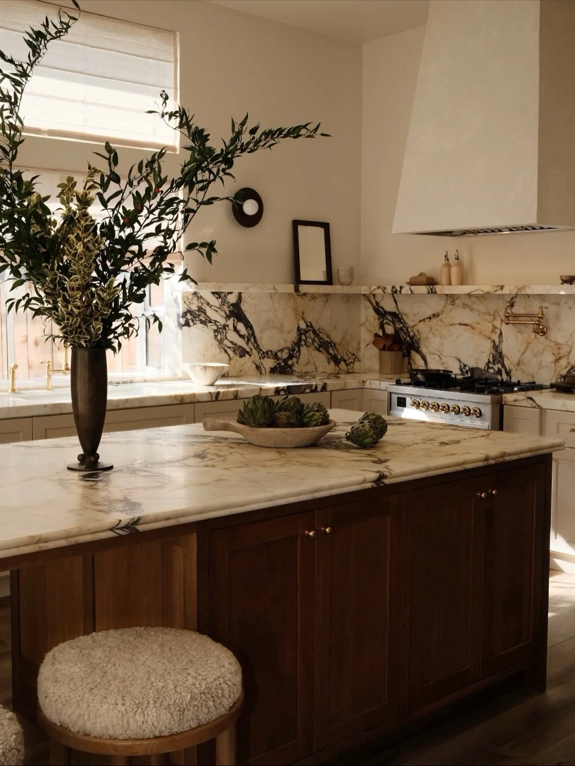 Dramatic Marble Slab Walls Create a Striking Kitchen Feature