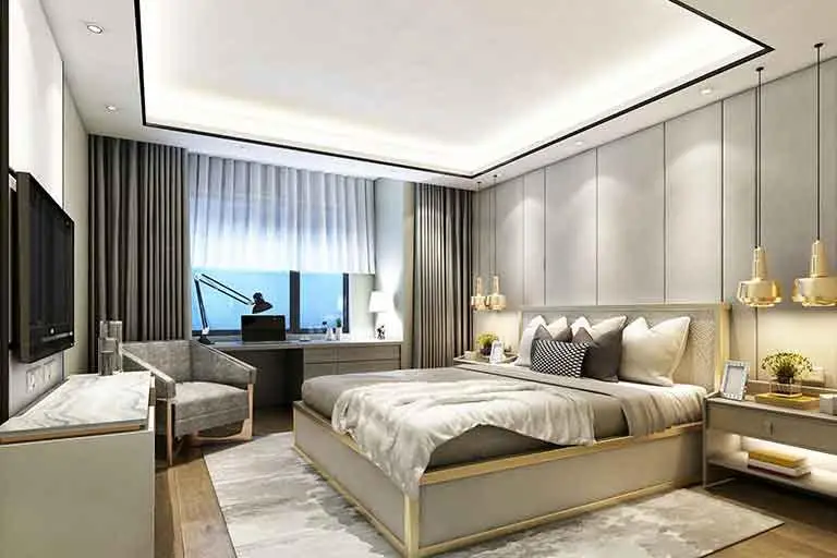 Gold Pendant Lights Add Warmth Above Bedside Tables