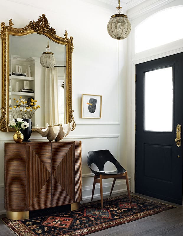 Ornate Gold Mirror Reflects Entryway Style