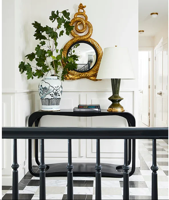 Snake Mirror Adds a Sculptural Element Above a Console