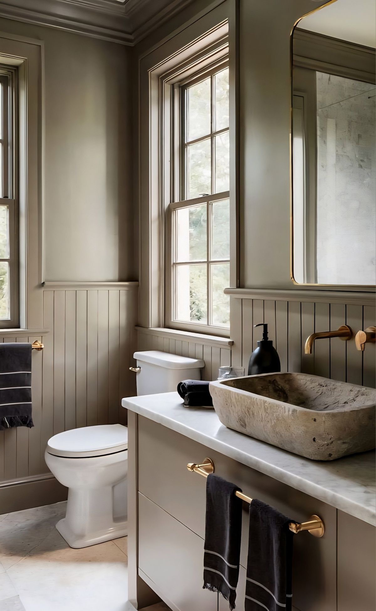 Carved Stone Vessel Sink Adds Organic Texture to Marble Countertop