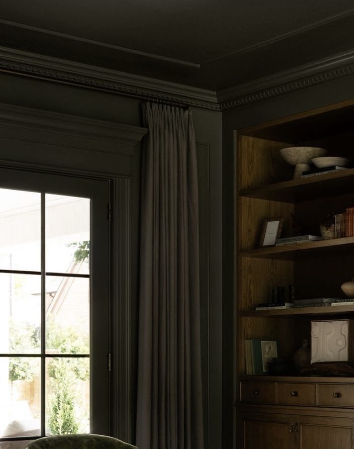 Dark Curtains Frame Windows for Moody Ambiance