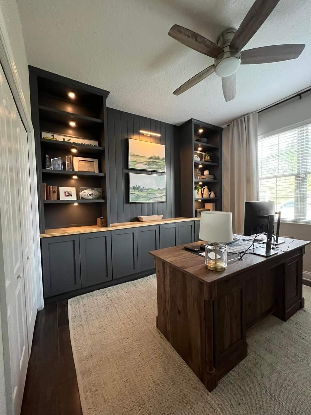 Built-in Dark Cabinets Provide Moody Storage