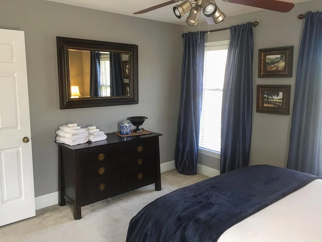 Anchor the Room With a Dark Wood Dresser