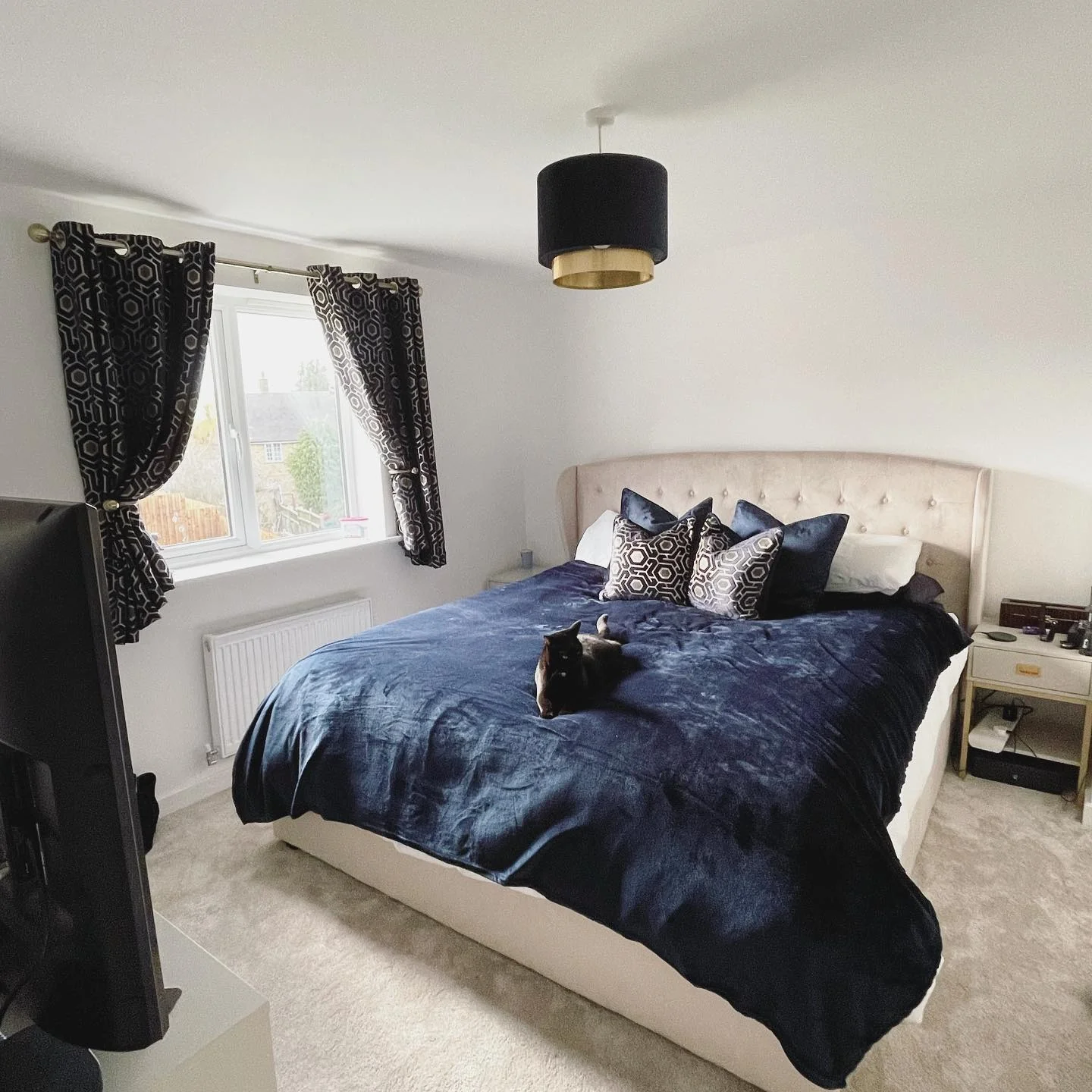 Frame Windows With Geometric Patterned Curtains