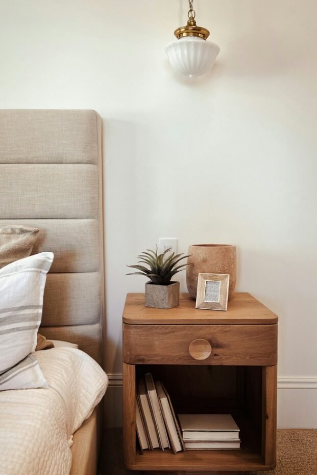 Wooden Nightstand With Open Shelf Displays Books