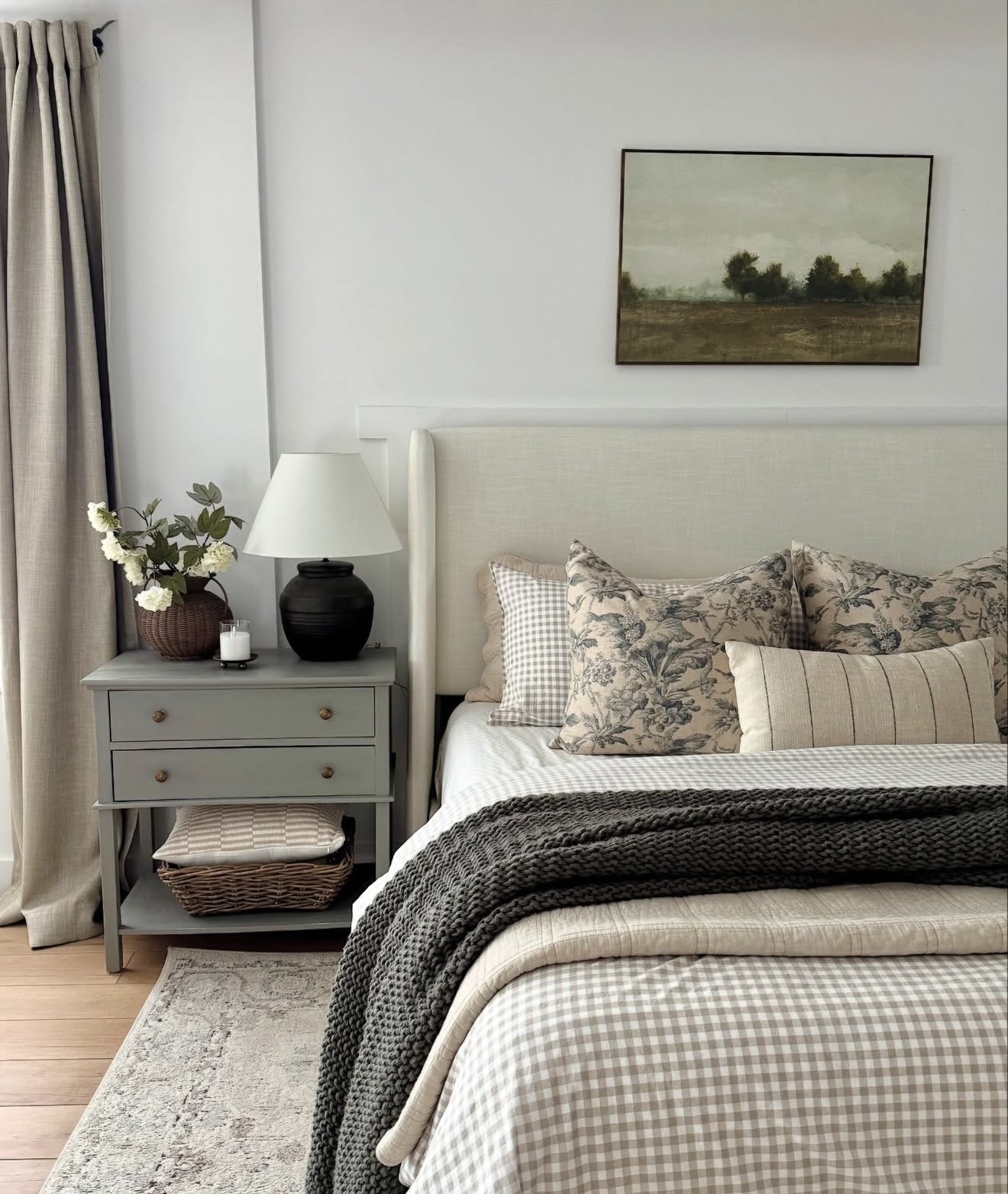Moody Landscape Painting Above the Headboard