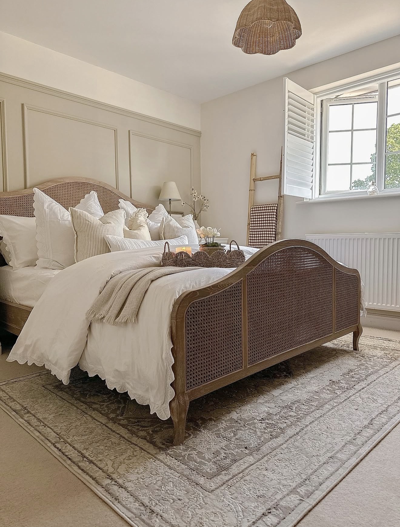 Cane Headboard Adds Natural Texture to the Neutral Bedroom