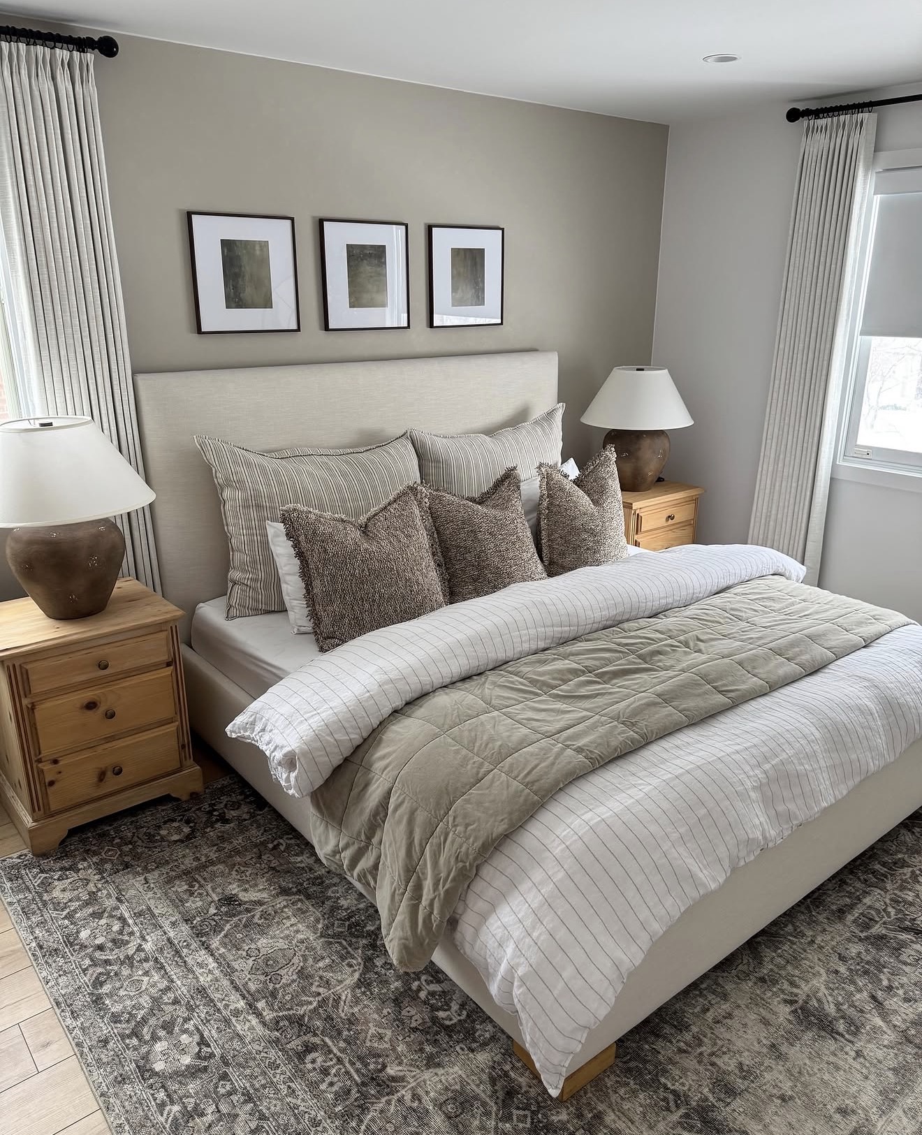 Framed Art Adds Earthy Tones Above the Bed