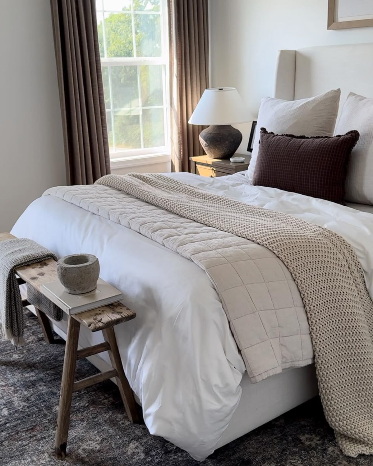 Rustic Wooden Stool Offers A Unique Bedside Surface