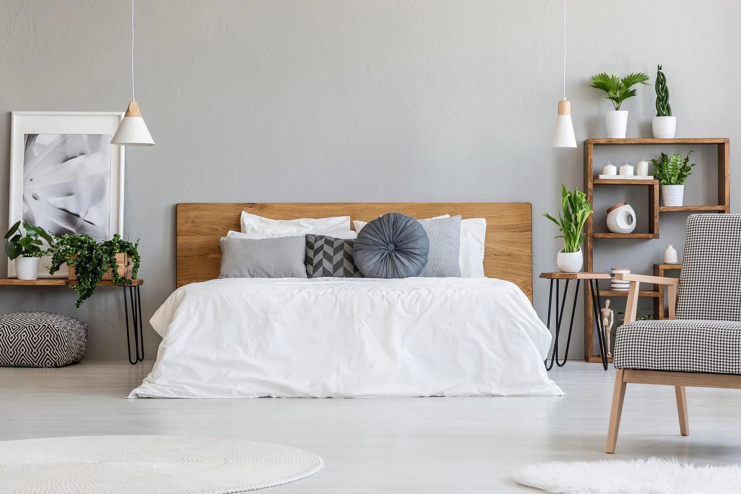 Wooden Headboard Frames a Serene White Bed