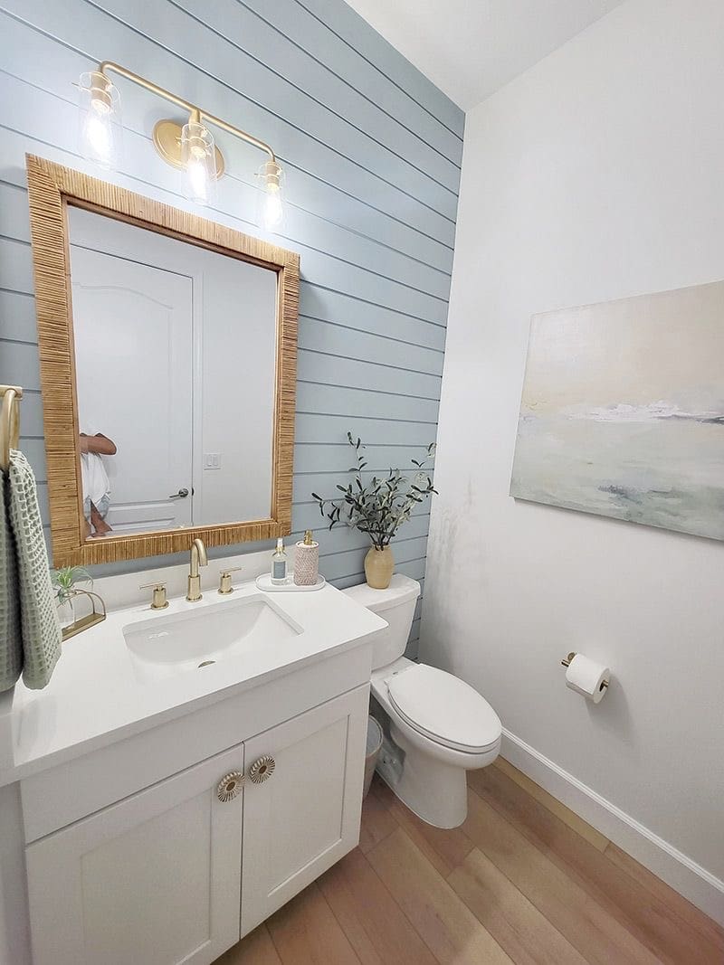 Frame the Vanity With a Rattan Mirror for Natural Warmth