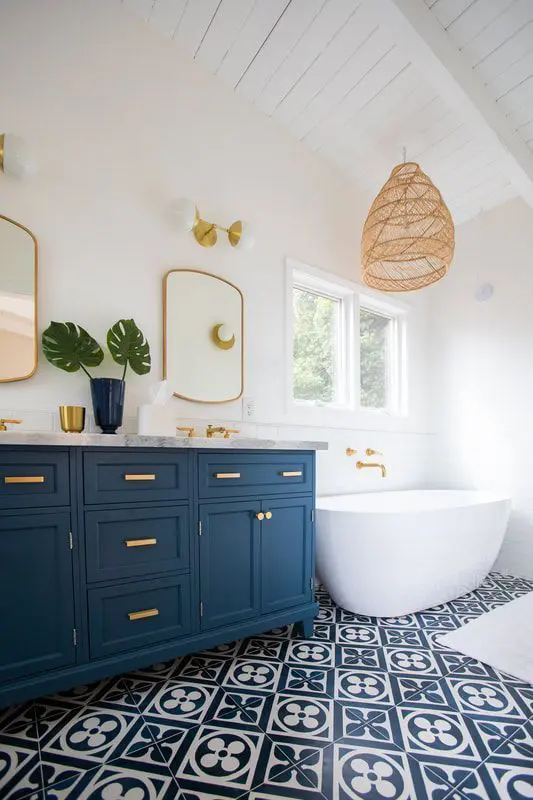 Bold Geometric Floor Tiles Anchor the Coastal Bathroom