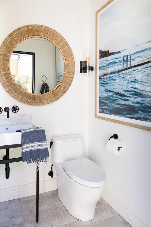 Large Coastal Artwork Sets a Serene Bathroom Scene