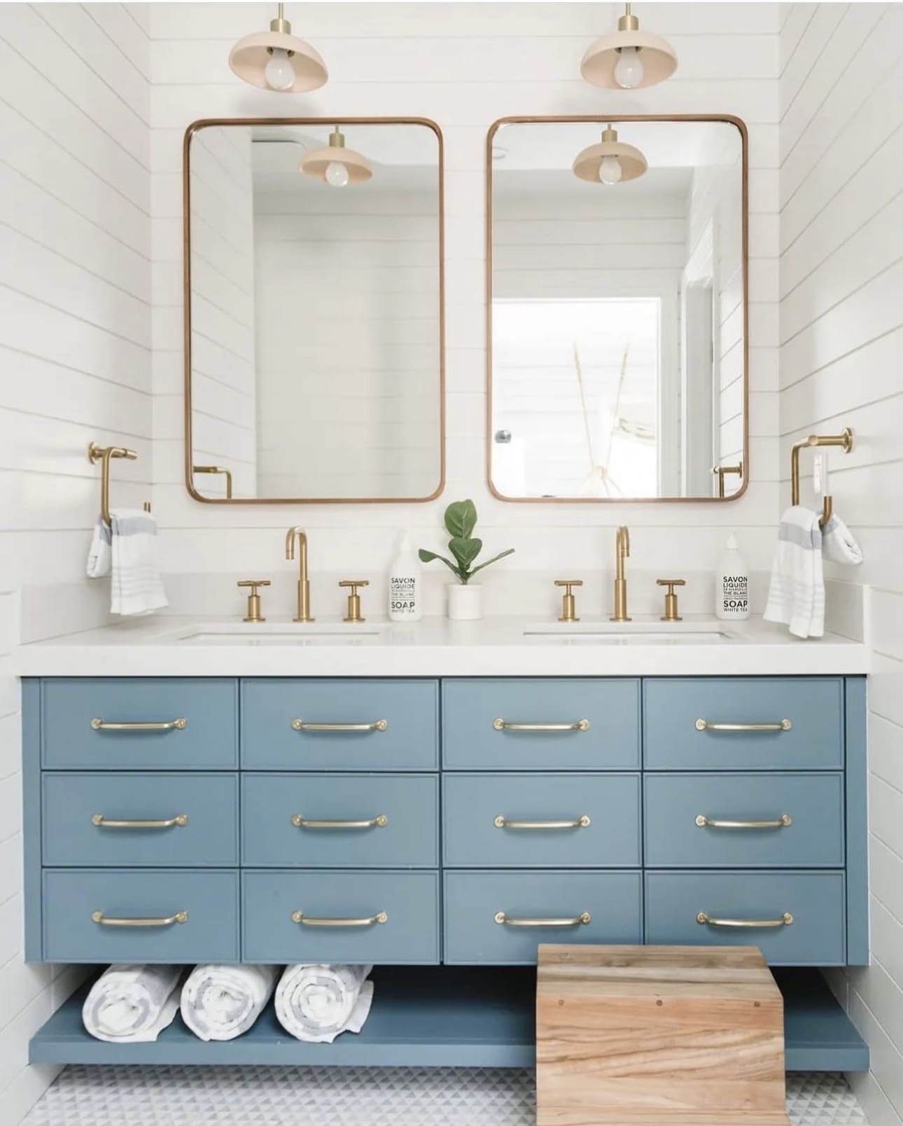 Choose a Blue Vanity With Brass Hardware for Coastal Charm