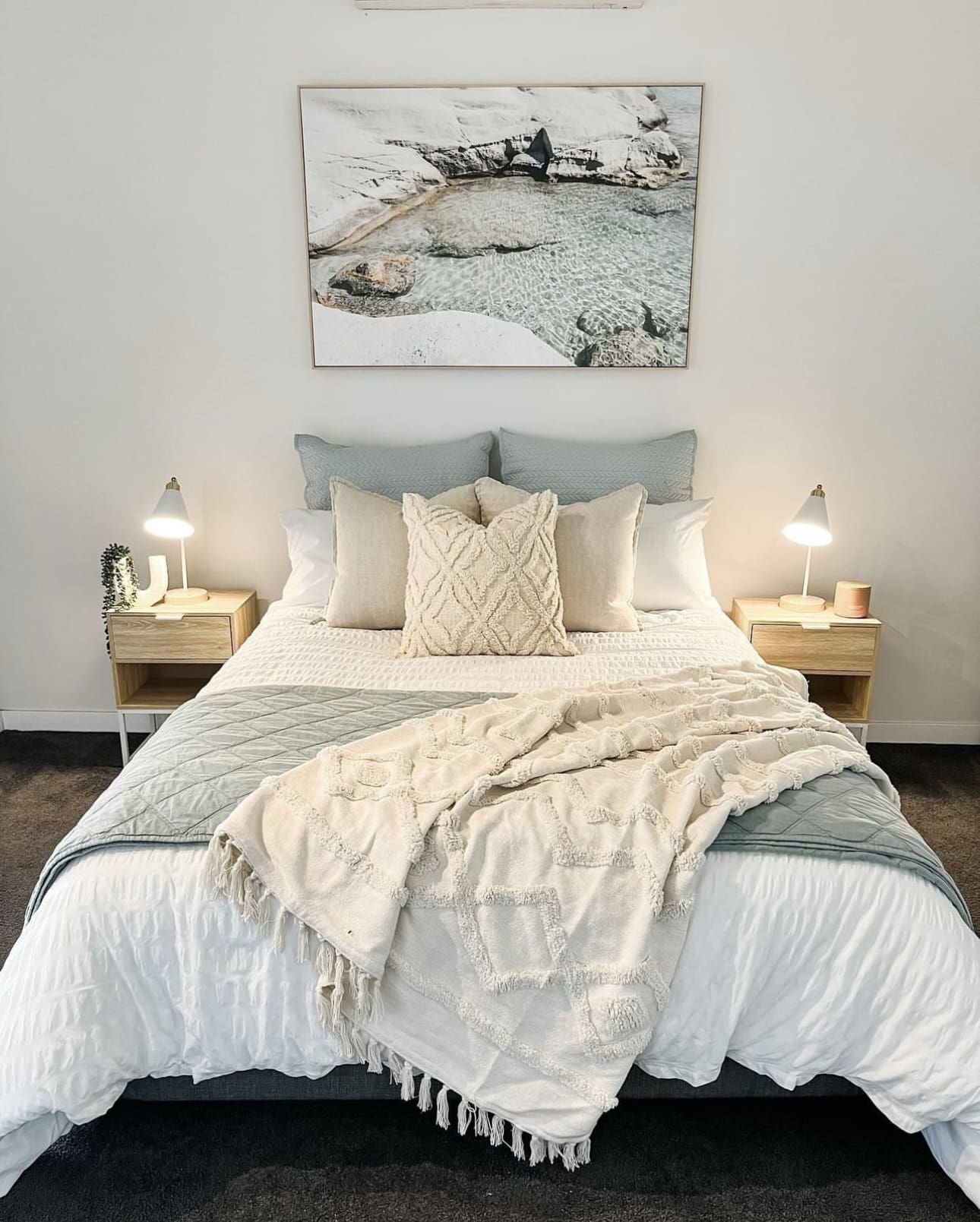 Large Artwork Captures Sunlit Rock Pools and Clear Water