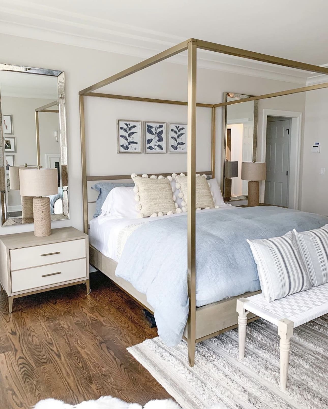 Three Botanical Prints Add Natural Symmetry Above the Bed