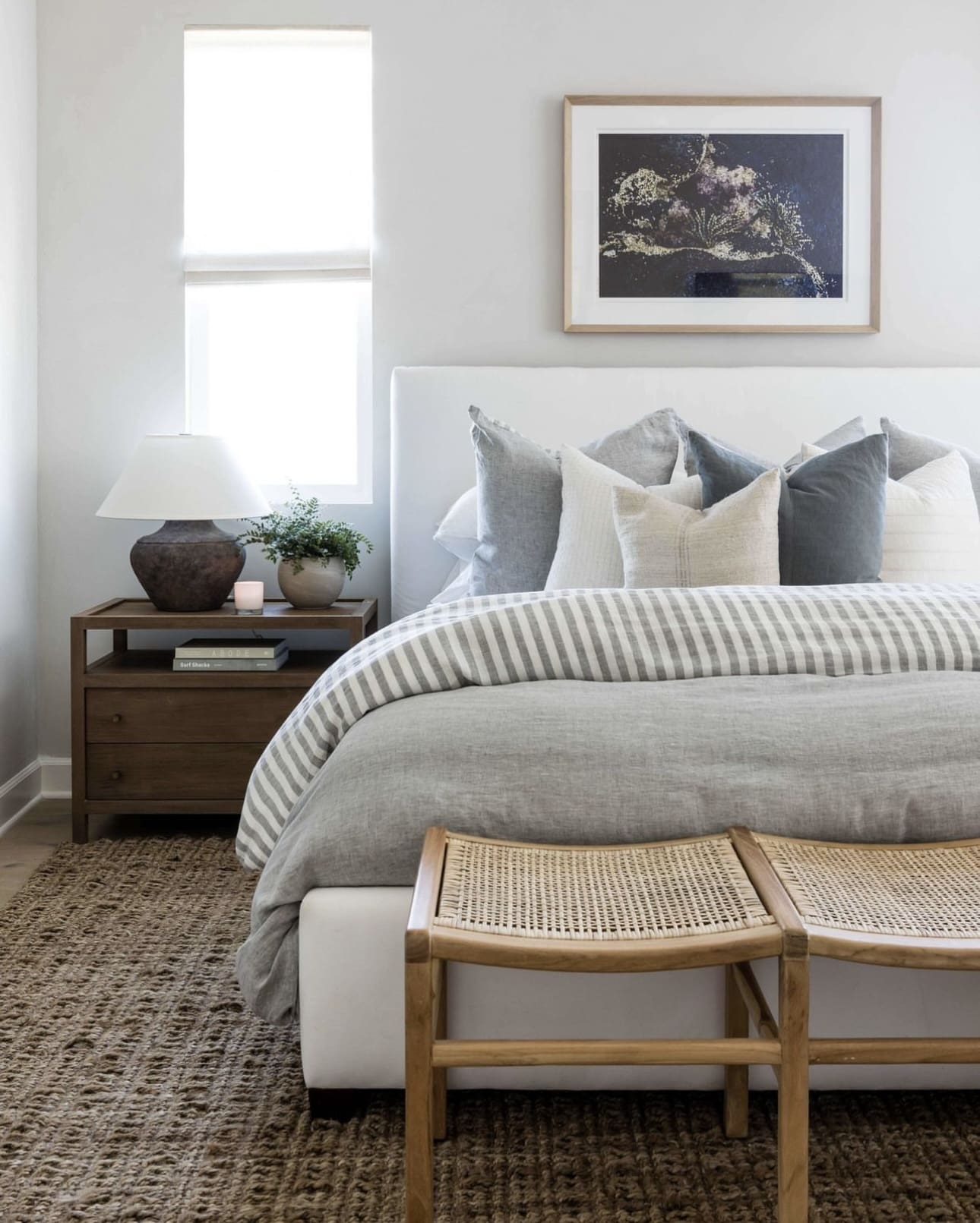 Dark Abstract Art Adds Moody Contrast Above the Bed