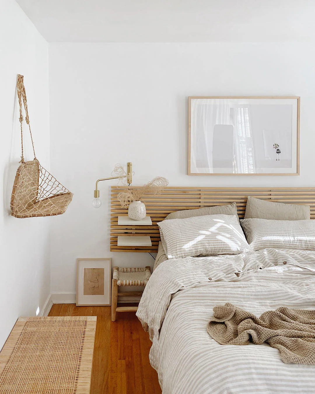Slatted Headboard Extends into Shelving