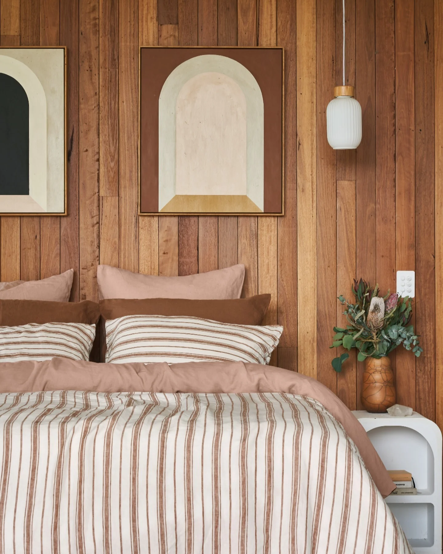 Arched Art Complements Wood-Paneled Walls