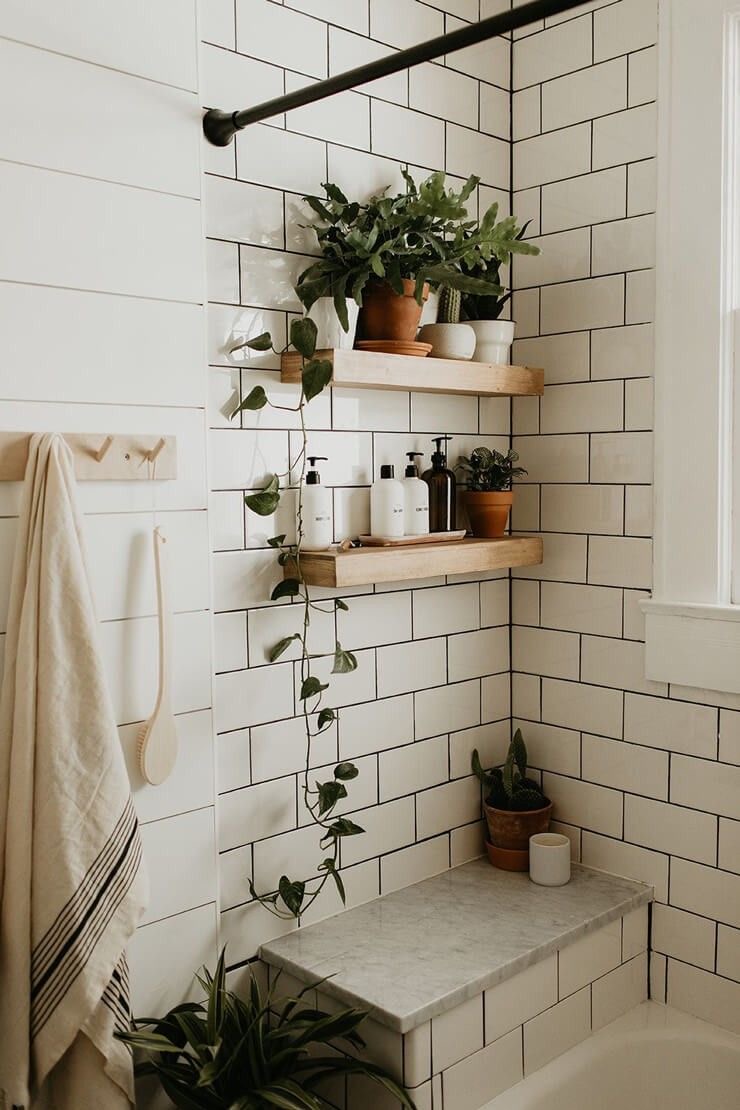 Floating Wood Shelves Hold Plants and Dispenser Bottles